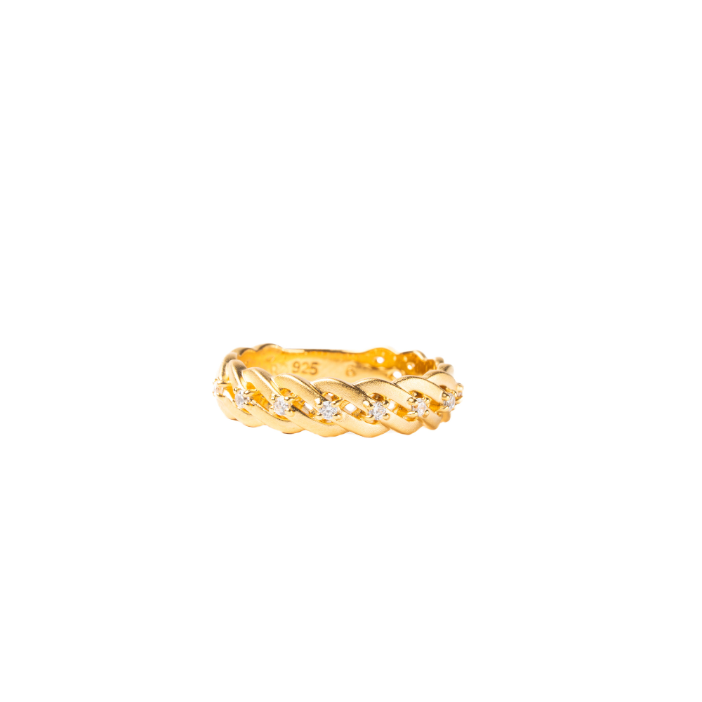 Gold ring with small diamonds on a white background