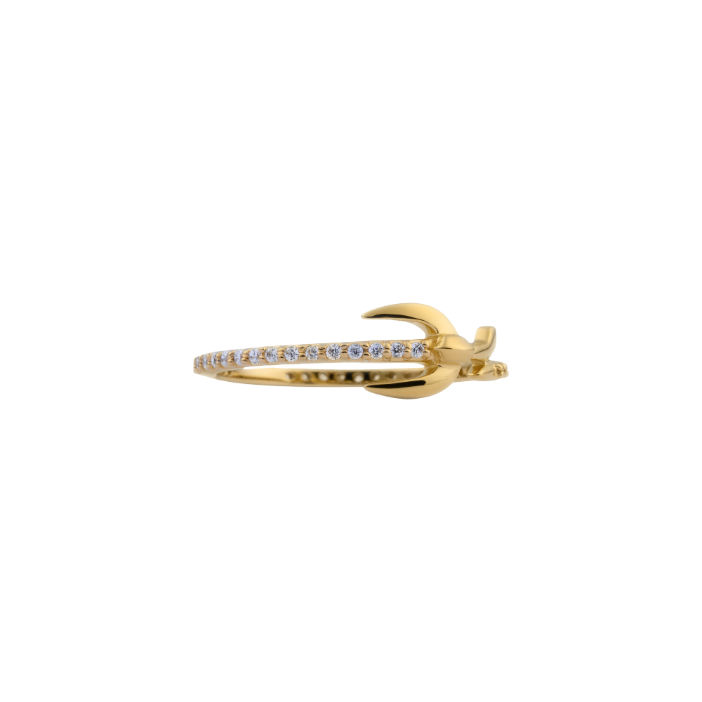 Gold plated ring with cubic zirconia stones on a white background
