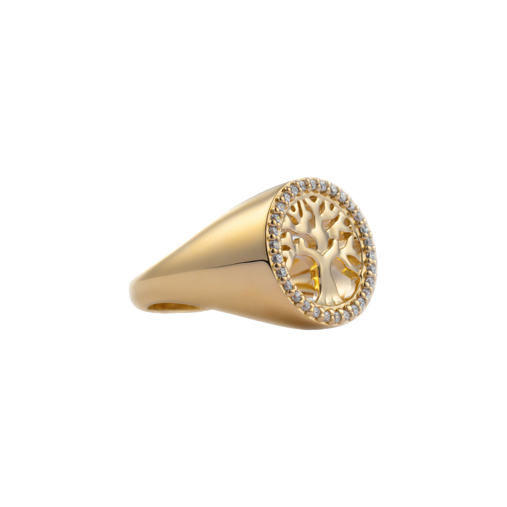 Gold plated ring with a design featuring a tree and leaves, encrusted with cubic zirconia stones.