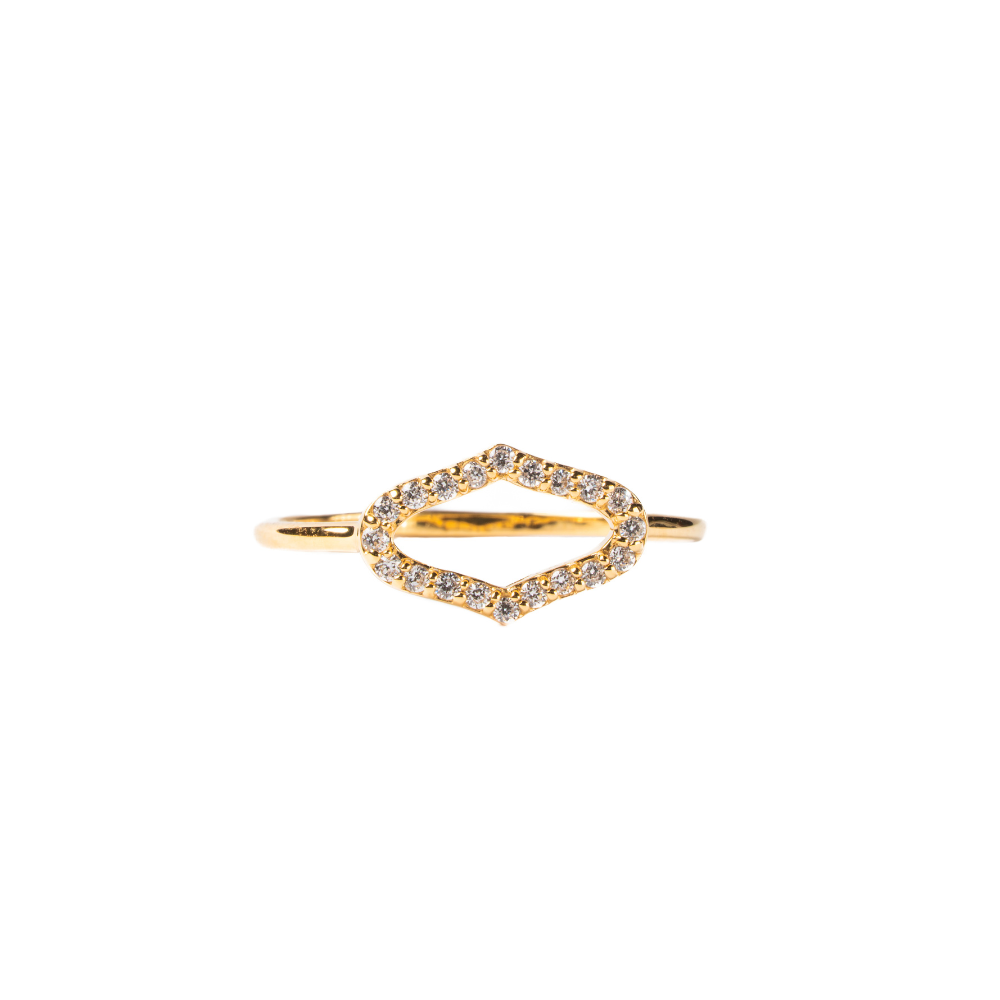 Gold ring with diamond accents on a white background