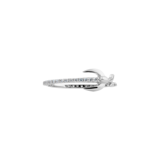 A silver rhodium-plated band ring with cubic zirconia stones set in it.