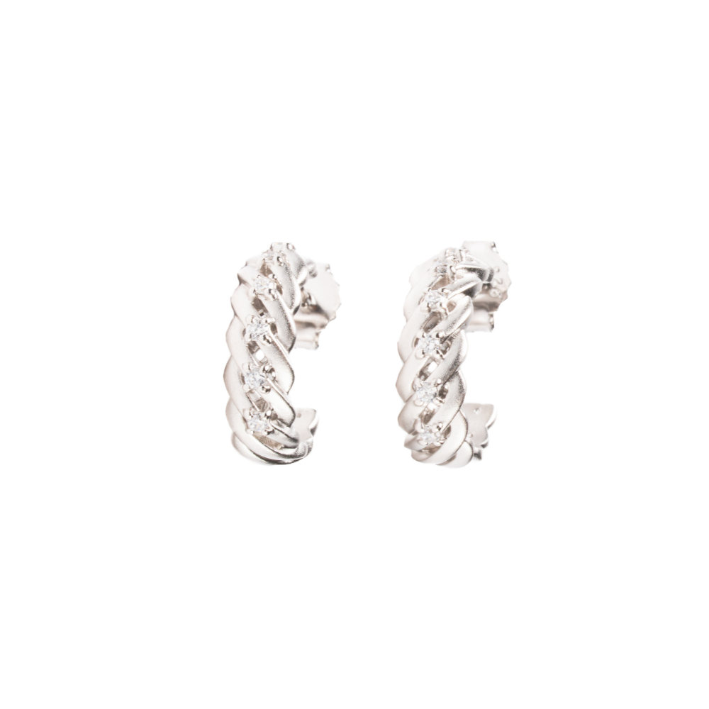 Pair of silver hoop earrings on a white background