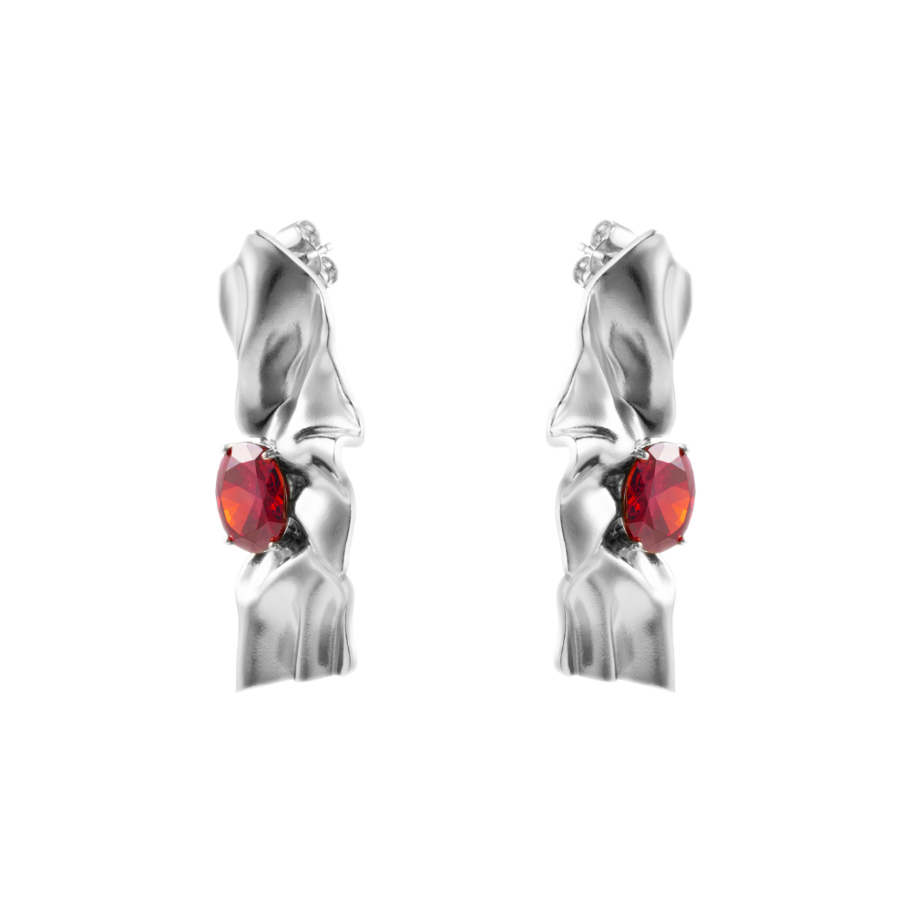 Side view of Victoria sterling silver earrings featuring deep red cubic zirconia garnet stones