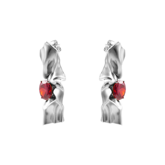 Side view of Victoria sterling silver earrings featuring deep red cubic zirconia garnet stones